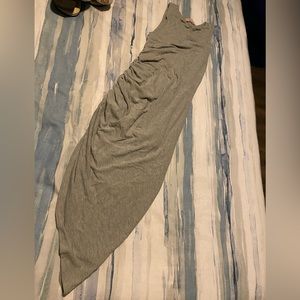 Saved by the dress boutique. Grey dress with side slit